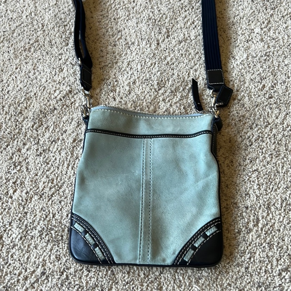 A small Coach crossbody bag. Great for when you need just a few things!
